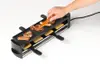 3014.60_e2_raclette_und_grillzange_swisstwist_farbig